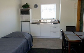 img_48570_15 a queen-size and a single bed in bedroom